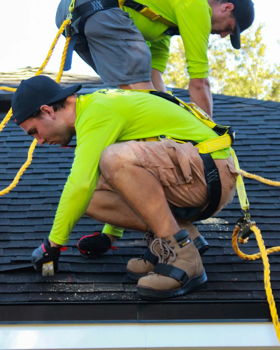 DDG roofing crew coordinating work on a property